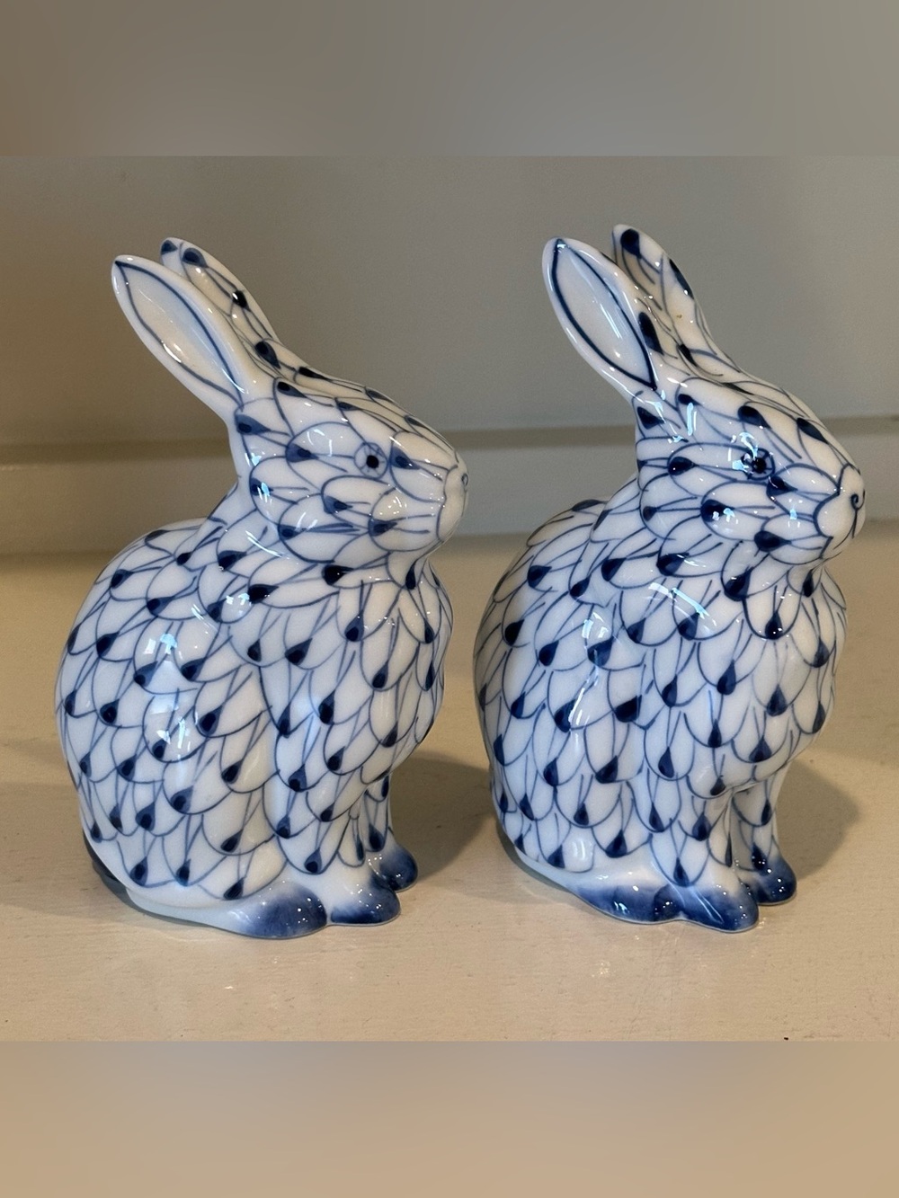 Set of 2 Andrea by Sadek handpainted porcelain blue fishnet bunny figurines